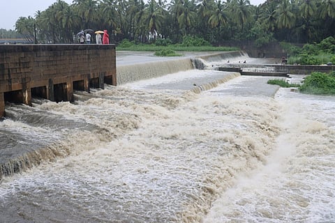 Surplus water gushing out from the Kumari check dam in Kanyakumari district.