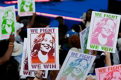 Attendees display signs for Democratic presidential nominee Vice President Kamala Harris during a campaign rally Thursday, Oct. 24, 2024, in Clarkston, Ga.