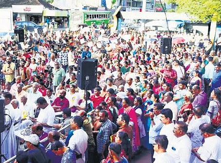 Munambam residents attend a meeting