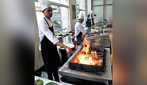 Chefs at Novotel, Hyderabad preparing dishes