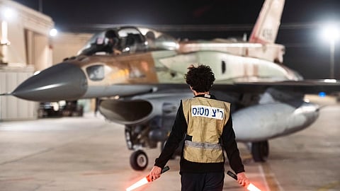 In this photo provided by the Israeli army, armed Israeli Air Force planes depart from an unknown location to attack Iran.
