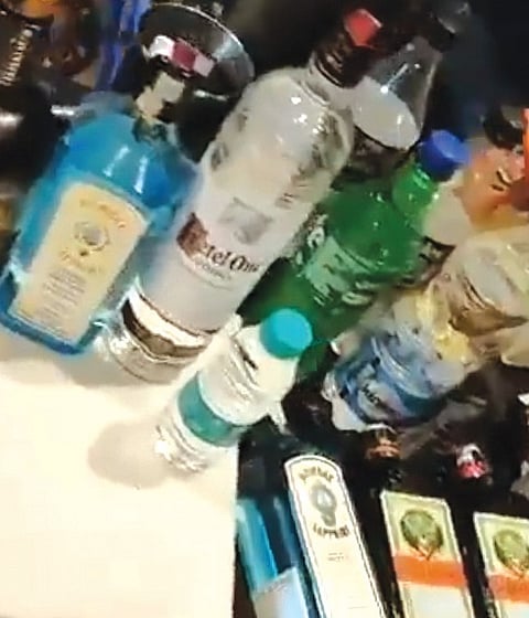The liquor bottles seized during raid