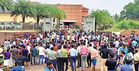 People outside the convention centre after the blast 