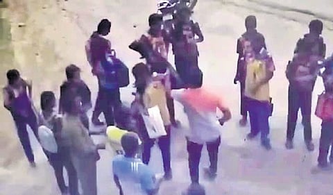 Screengrab of the teacher assaulting the girl 