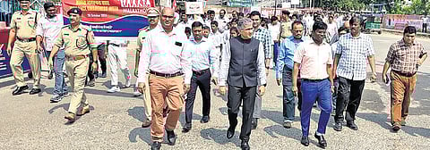 DRM Narendra A Patil and take part in a walkathon in Vijayawada