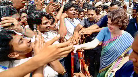 General Secretary Priyanka Gandhi Vadra greets the students of Nilgiri College of Arts and Science, in Thaloor.