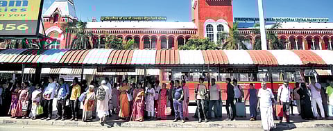 No seats for commuters at bus stand near Chennai central railway station
