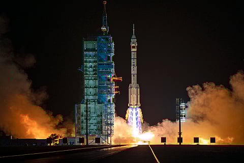 A Long March rocket with a Shenzhou-19 spacecraft atop takes off from the Jiuquan Satellite Launch Center in Jiuquan, northwestern China in the early hours of Wednesday, Oct. 30, 2024