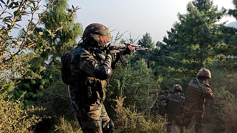 Army jawans near the site of the encounter between security forces and terrorists on the second day after terrorists fired at an ambulance that was part of an Army convoy, in Akhnoor sector of Jammu and Kashmir, Tuesday, Oct. 29, 2024. 
