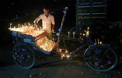 People across India revel in Diwali; Delhi defies firecracker ban