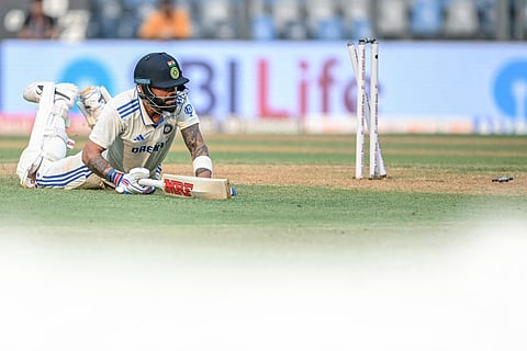 Virat Kohli was run out for 4 in the last over of the day (Photo | AFP)