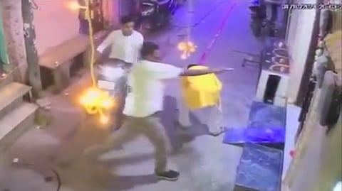 CCTV footage shows the assailant can been seen shooting at the victim from outside his residence in Shahdara, Delhi, Oct. 31,2024.