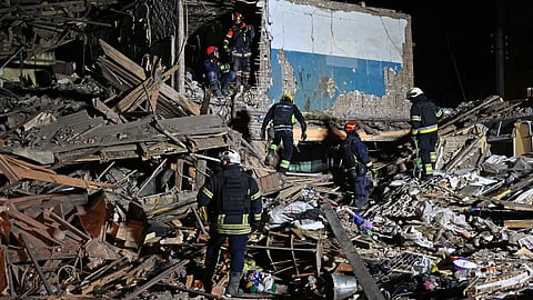 Rescuers of the State Emergency Service inspect the remains of a residential building after a strike in Kharkiv, on November 1, 2024,