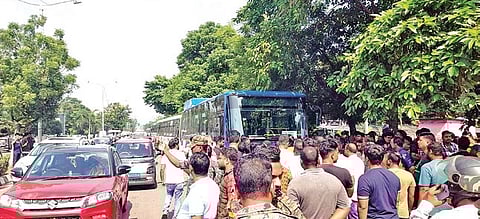 Locals protesting after the accident were a woman sustained serious injuries after being hit by a speeding Mo Bus in the city