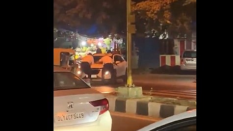 Two Delhi Police officers were dragged atop the bonnet of a car for more than 20 metres after they attempted to stop the vehicle in southwest Delhi.