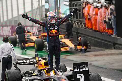 Red Bull driver Max Verstappen of the Netherlands, celebrates after winning the Brazilian Formula One Grand Prix at the Interlagos race track, in Sao Paulo, Brazil.