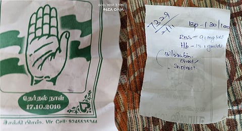 Congress functionary opposed doctors of Thisayanvilai UPHC tearing his partys notices and using them as prescription and entry chit.