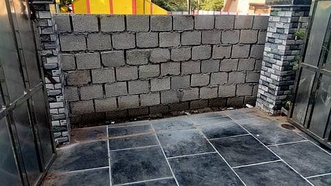 Alaguvel built a wall in 2019 blocking the gate of his house and claimed ownership of 2.5 cents of land between Malmarugan’s house and the road.