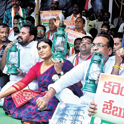 APCC president YS Sharmila stages a protest at Dharna Chowk in Vijayawada on Wednesday