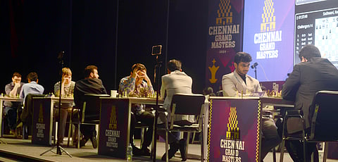 India GM Vidit Gujrathi (2nd R) and the rest of the participants in analytical mood during the second round of the Chess Grand Masters in Chennai, on Wednesday.