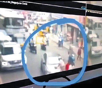 A screen grab of the incident shows the car with the home guard on its bonnet