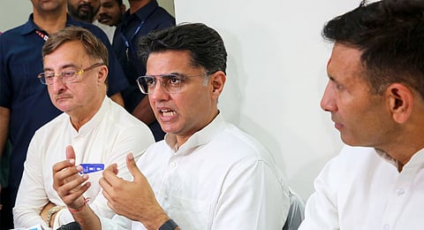 Congress leader Sachin Pilot with Rajya Sabha MP Vivek Tankha and Madhya Pradesh party President Jitendra Patwari addresses a press conference, in Bhopal, Thursday, Nov. 7, 2024.