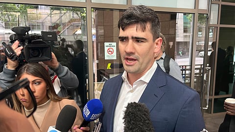 Tim Smartt, the lawyer for Jacob Hersant, arrives at Melbourne Magistrates Court in Melbourne, Australia, Nov. 8, 2024, for Hersant's sentencing after he was convicted for performing the Nazi salute.