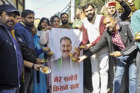 Members of the Bharatiya Janata Yuva Morcha (BJYM) during a march against the Himachal Pradesh government over the 'samosa' controversy, in Shimla, Saturday, Nov 9, 2024. 