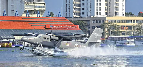 The de Havilland Canada - 6 Twin Otter aircraft landing at Bolgatty during its trial flight from Vijayawada on Sunday