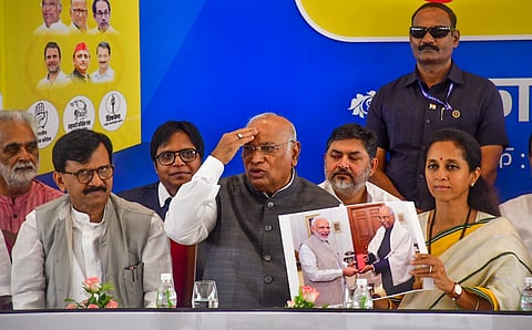 Congress President Mallikarjun Kharge, Shiv Sena (UBT) MP Sanjay Raut and NCP (SP) MP Supriya Sule during the release of Maha Vikas Aghadi's manifesto for Maharashtra Assembly elections, in Mumbai, Sunday, Nov. 10, 2024.