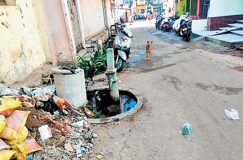 Stagnated water and garbage strewn near a tubewell in Jemadei Pentha.