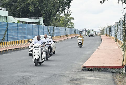 Vehicular traffic on the newly-opened flyover at Kanuru on Tuesday