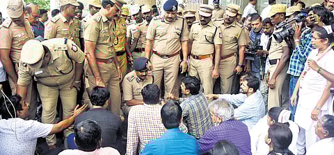 Doctors protesting at the Kalaignar Centenary Super Specialty Hospital in Guindy on Wednesday