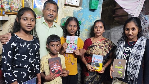 M Dhivyadharshini, M Narmada and Jyoti Sri with their family and Thomas L
