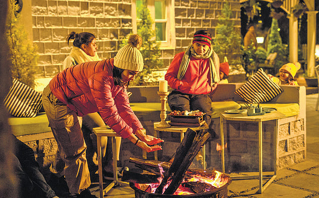 Guests enjoy a bonfire at Elgin Hall in Dalhousie.