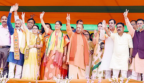 Uttar Pradesh Chief Minister Yogi Adityanath with other BJP leaders during a public meeting ahead of the second phase of Jharkhand Assembly elections, at Nirsa Assembly constituency in Dhanbad district, Jharkhand.