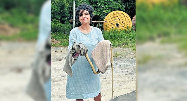 Khanduja with a snake she rescued