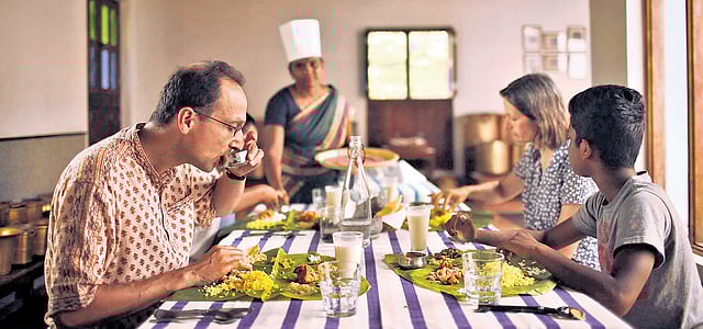 A family enjoys local food at Visalam in Chettinad.