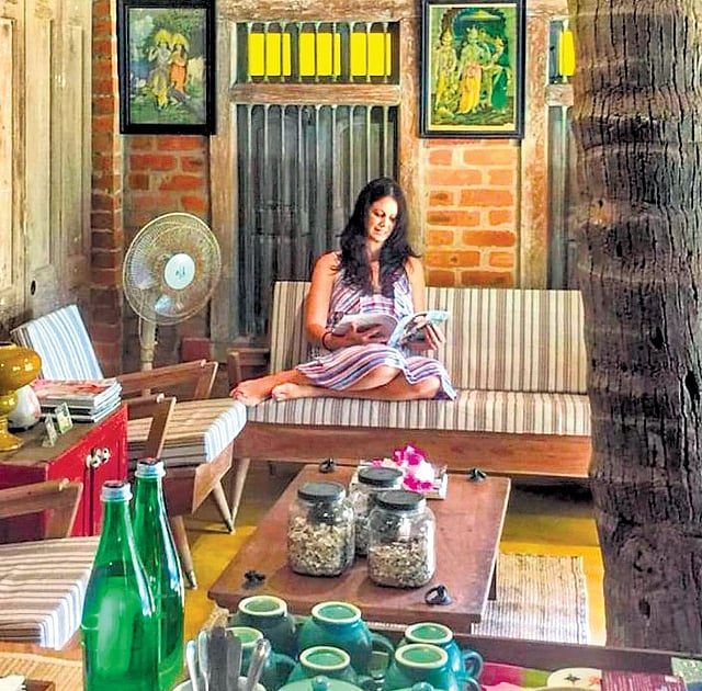 A guest relaxing at the Turiya Villa in South Goa.