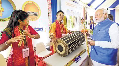 PM Narendra Modi during a visit to an exhibition at the inauguration of the first Bodoland Mohotsav on Friday 