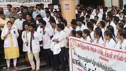 Government doctors participating in the protest seeking safety at workplace, infront of Madurai Medical College in Madurai.