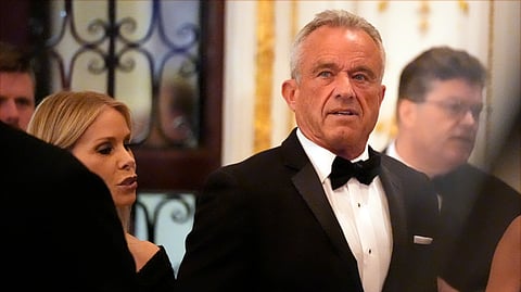 Robert F. Kennedy Jr., and his wife Cheryl Hines arrive before President-elect Donald Trump speaks during an America First Policy Institute gala at his Mar-a-Lago estate, Thursday