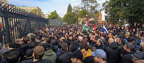 Police and protesters clash in Georgia's separatist Abkhazia region over pro-Moscow property measure