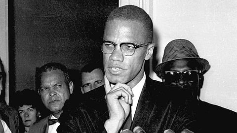 Malcolm X speaks to reporters in Washington, D.C., May 16, 1963.