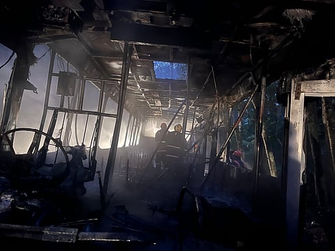 The bus was fully gutted in the devastating fire even before the fire fighters fully doused the fire. 