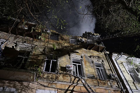 This photograph shows a heavily damaged residential building following a Russian strike in Odesa on November 15, 2024