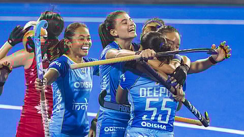 Indian players celebrate after scoring a goal during the Women's Asian Champions Trophy 2024 hockey match between India and Japan, at Rajgir, Bihar.