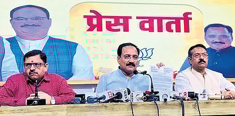 Delhi BJP president Virendra Sachdeva (centre) 