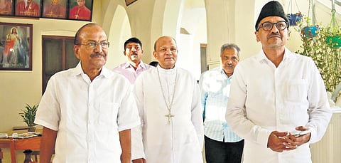 IUML leaders Panakkad Syed Sadiq Ali Shihab Thangal and P K Kunhalikutty 
with Bishop Varghese Chakkalakal following the meeting at the Varapuzha archdiocese headquarters in Kochi on Monday.