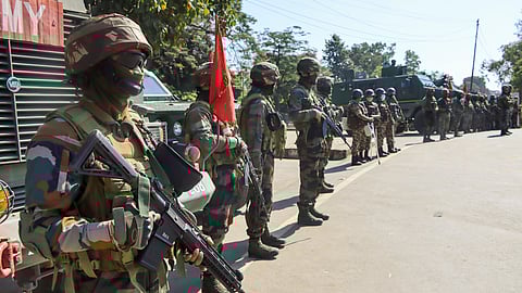 Security personnel deployed to maintain law and order amid curfew imposed in view of recent violence in Manipur, in Imphal.